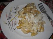 Una foto de penne al graten