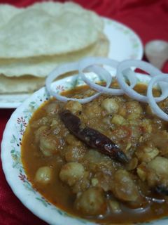 ছোলে ভটুরে (chole bhature recipe in Bengali) রেসিপির প্রধান ছবি