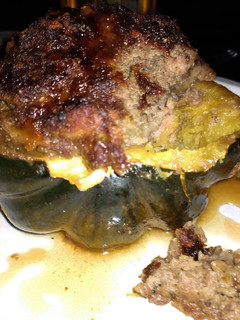 A picture of Coconut ginger and beef stuffed acorn squash.