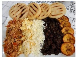 Una foto de Arepas