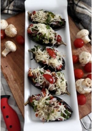 A picture of Stuffed Veggie-Mushroom-Tofu Baked Aubergine Boats.