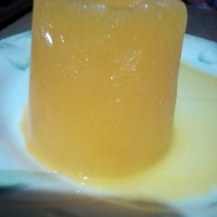 A picture of Orange Tang ice lolly.