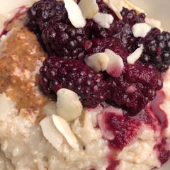A picture of Berry and almond porridge -vegan.
