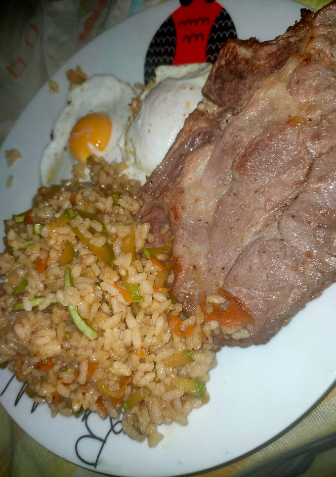 Una foto de Chuletas de aguja con arroz a mi manera