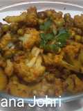 Cauliflower, Peas, and Potatoes with Tomato Puree