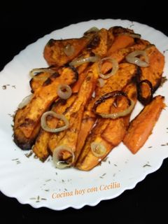 Una foto de Boniatos asados al horno, con comino