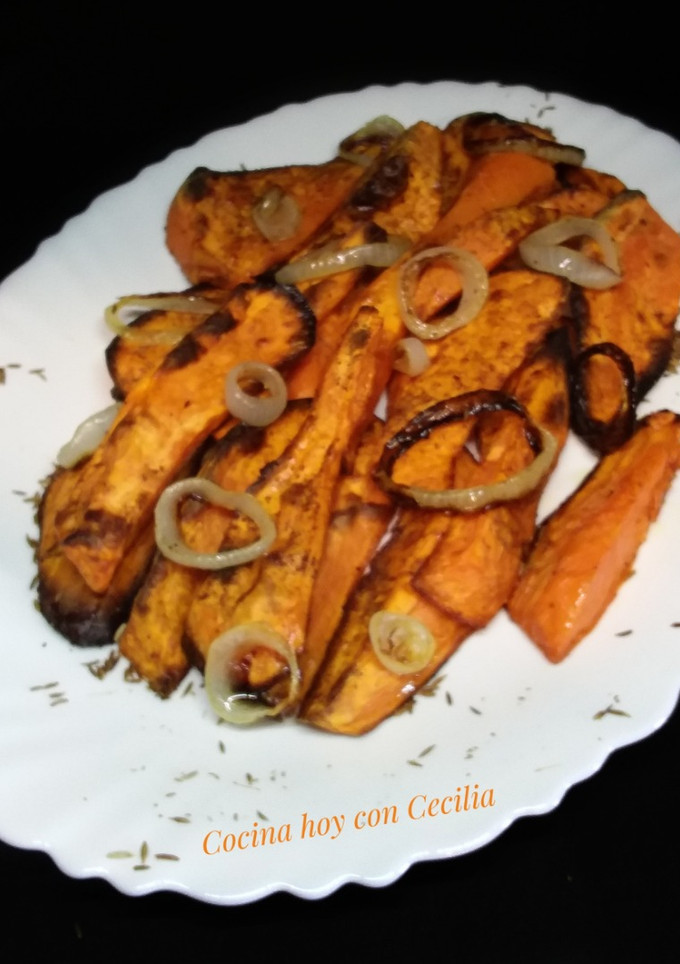 Una foto de Boniatos asados al horno, con comino
