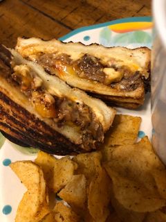 A picture of BBQ brisket grilled pimento cheese sandwich.
