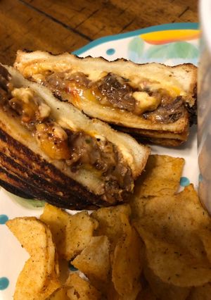 A picture of BBQ brisket grilled pimento cheese sandwich.