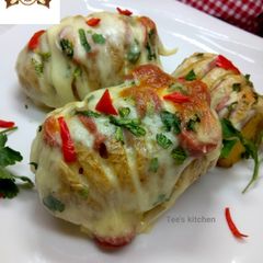 A picture of Baked cheesy potatoe.
