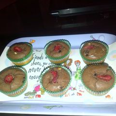 A picture of Chocolate muffins with strawberry love.
