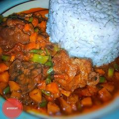 A picture of Tomatoes vegetable stew.