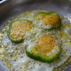A picture of Peppered fried eggs.