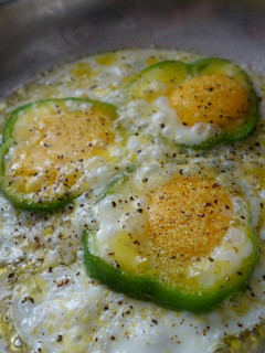 A picture of Peppered fried eggs.