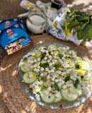 Carpaccio de calabacín con queso, frutos secos y albahaca