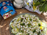 Carpaccio de calabacín con queso, frutos secos y albahaca
