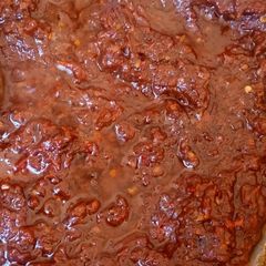 A picture of Tomatoes stew.