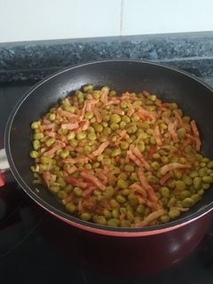 Una foto de Habitas tiernas en aceite de oliva
