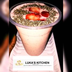 A picture of Strawberries and Banana milkshake.