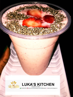 A picture of Strawberries and Banana milkshake.