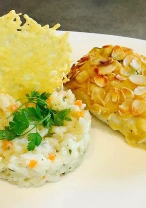 Une photo de Dos de Cabillaud aux Amandes et Risotto