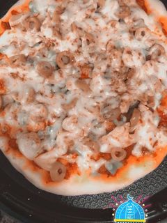 صورة لوصفة عجينة البيتزا بالاله 🍕