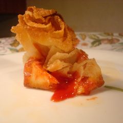 A picture of Pizza Money Bags with Chicken salami.