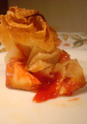 A picture of Pizza Money Bags with Chicken salami.