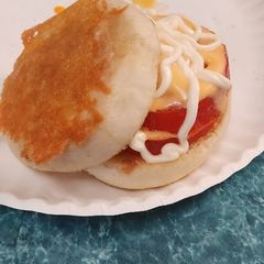 A picture of Tomatoes Sandwich.