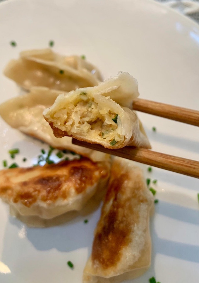 Una foto de Gyoza de langostinos