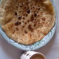 QEEMA BAHARA PARATHA WITH TEA ☕ A picture of QEEMA BAHARA PARATHA WITH TEA ☕.