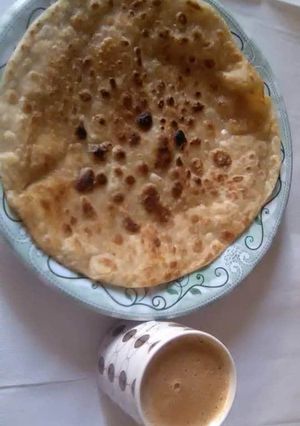 A picture of QEEMA BAHARA PARATHA WITH TEA ☕.