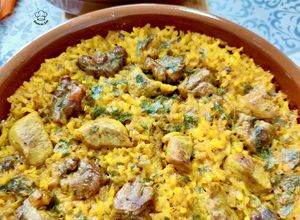 Una foto de Arroz al horno trufado con carrillada y solomillo