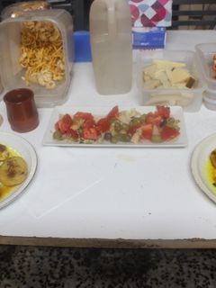 Una foto de Trucha con patatas y alcachofas