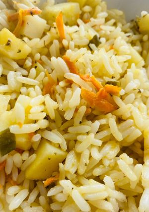 Una foto de Arroz Pregraneado con papas