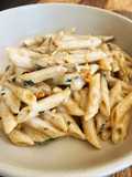 Cream cheese pasta with pine nuts and cranberries