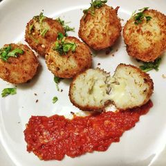 A picture of Arancini balls from leftover rice.