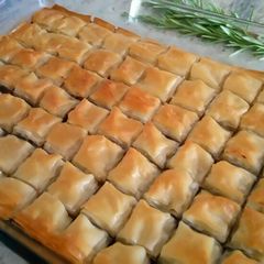 A picture of Baklava with date filling.
