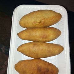 A picture of Fried potato pocket buns.
