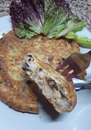 Una foto de Tortilla de camarón y kani kama