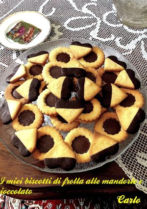 Foto di BISCOTTI di frolla alle mandorle : occhi di bue e biscottini con cioccolato
