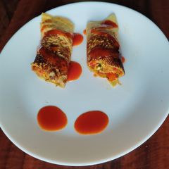 A picture of Stuffed moong dal wrap.