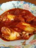 Alitas de pollo con tomate y toque picante