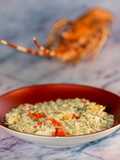 Risotto con Aragasta e Carpaccio di Salmone Selvaggio