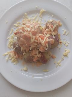 Una foto de Papas chorreadas