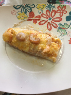 Una foto de Merluza gratinada