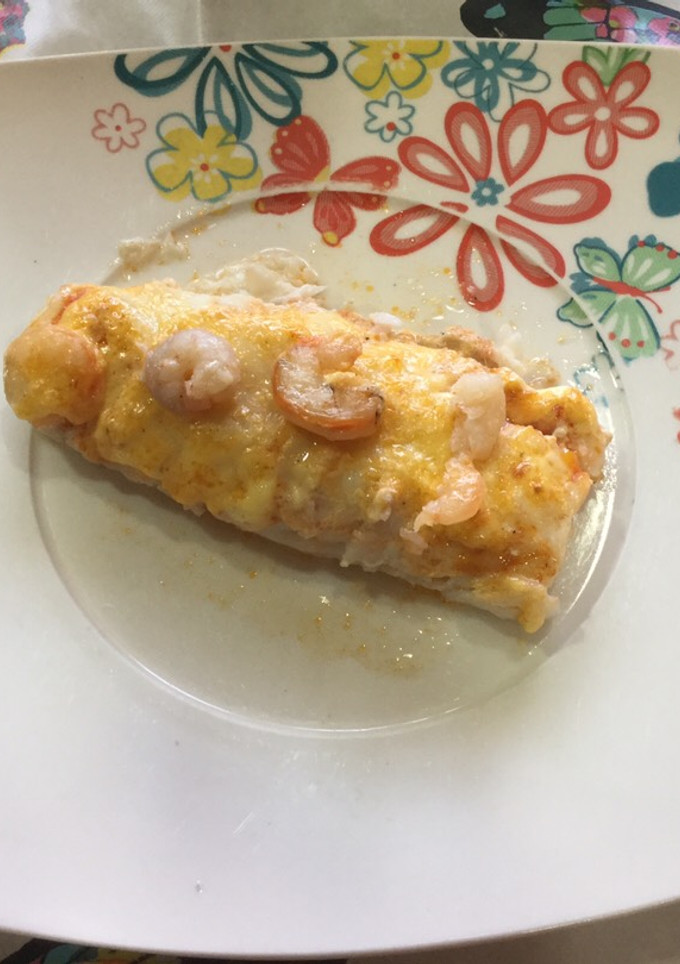Una foto de Merluza gratinada
