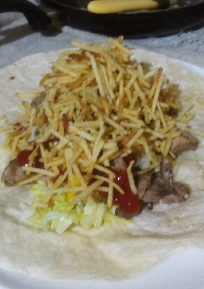 Una foto de Tortillas de harina de trigo con cerdo