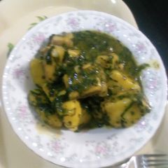 A picture of Yam porridge and vegetables.