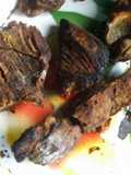 Traditional way of roasting beef and making its stew